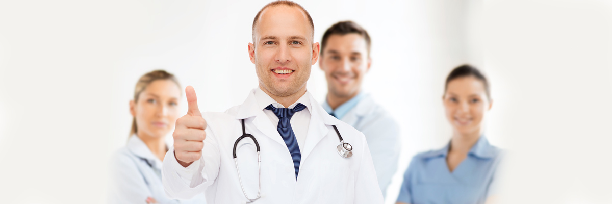 smiling male doctor with stethoscope